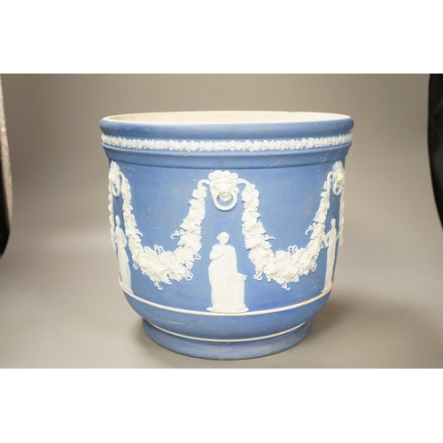 1300 - A Wedgwood blue jasper jardiniere, sprigged with muses and swags, height 23cm