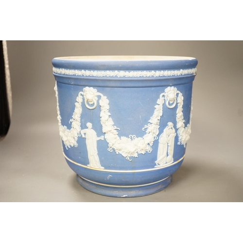 1300 - A Wedgwood blue jasper jardiniere, sprigged with muses and swags, height 23cm