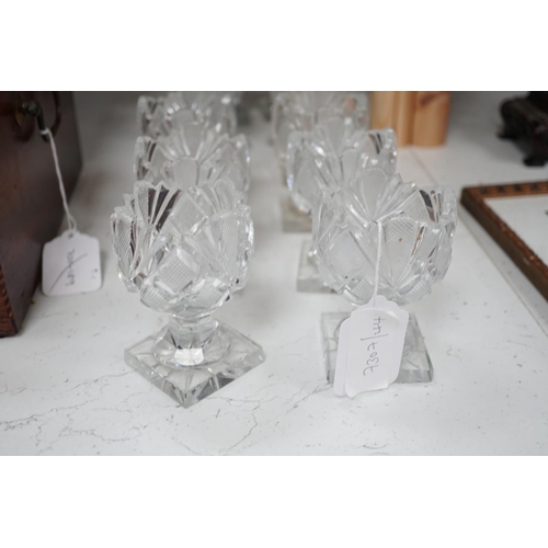 1309 - A set of twelve Victorian square base cut glass salts and four other 19th century clear glass salts.... 