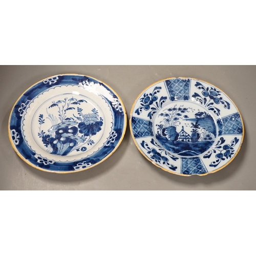 1312 - Two 18th century Dutch Delft blue and white plates, largest 23cms diameter