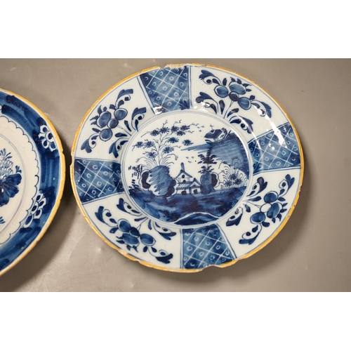 1312 - Two 18th century Dutch Delft blue and white plates, largest 23cms diameter