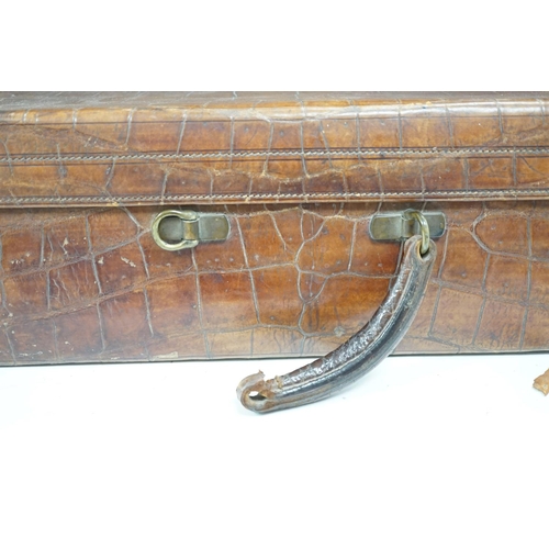 1326 - An early 20th century crocodile skin suitcase - 60cm wide