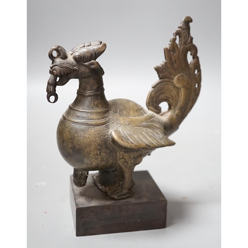 1489 - A 19th century Indian engraved bronze bird on plinth, 14.5cm wide