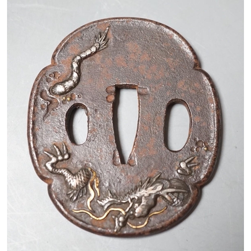 1496 - A Japanese Meiji silver and gold overlaid iron tsuba, 6.5cm high