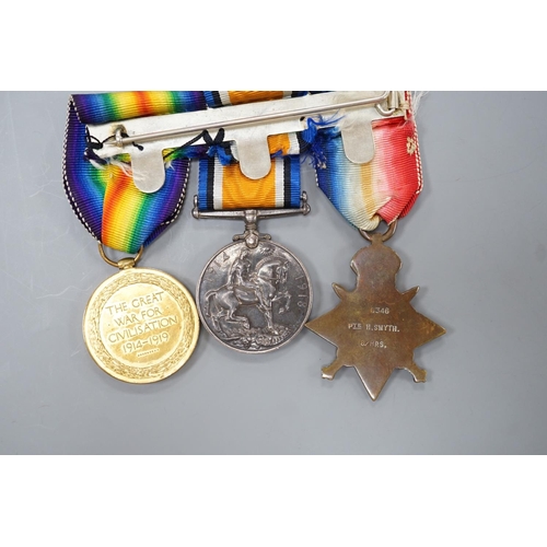 1499 - A WWI Mons star (with later bar) trio to 6346 PTE. H. SMYTH 8/HRS.