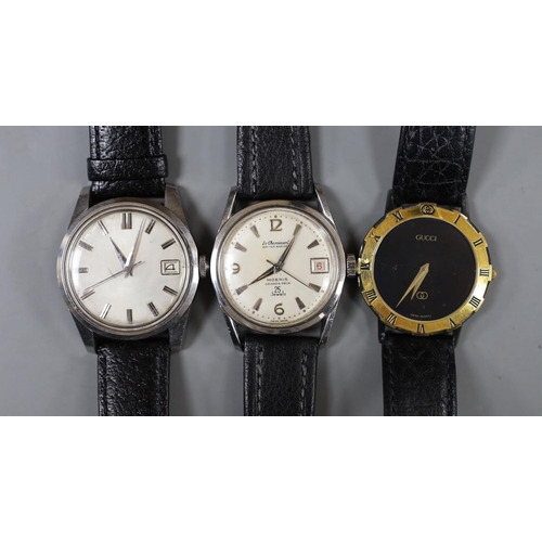 1894 - A gentleman's steel Le Chamois wrist watch, a gentleman's gold plated Gucci wrist watch and a gentle... 