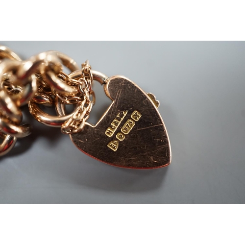 1895 - An Edwardian 9ct gold curb link bracelet wit heart shaped padlock clasp, approx. 18cm, 11.4 grams.... 