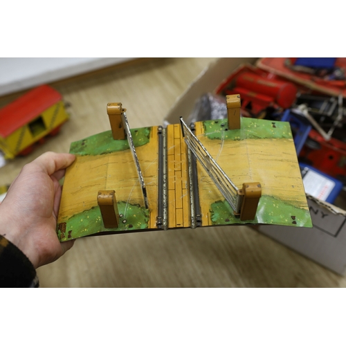 1323 - A mixed quantity of Hornby model railway track, a metal crossing, an engine and other items