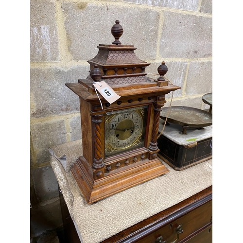 120 - An early 20th century walnut mantel clock, height 53cm together with a set of Victorian scales... 