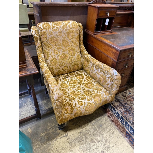 124 - A late Victorian upholstered armchair, width 72cm, depth 80cm, height 90cm