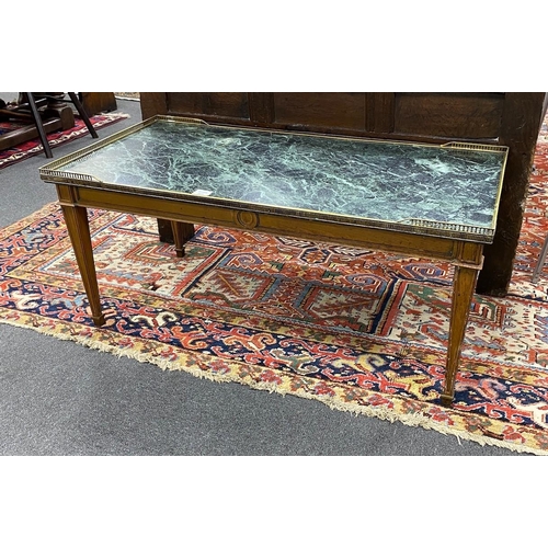 129 - A Louis XVI style rectangular marble topped coffee table, length 110cm, depth 55cm, height 50cm... 