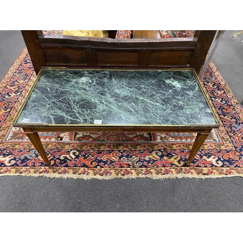 129 - A Louis XVI style rectangular marble topped coffee table, length 110cm, depth 55cm, height 50cm... 