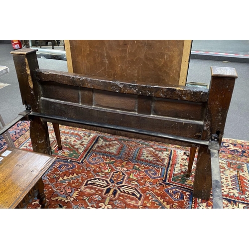 132 - A 17th century style carved oak single head and foot bedstead, length 210cm, width 127cm, height 172... 