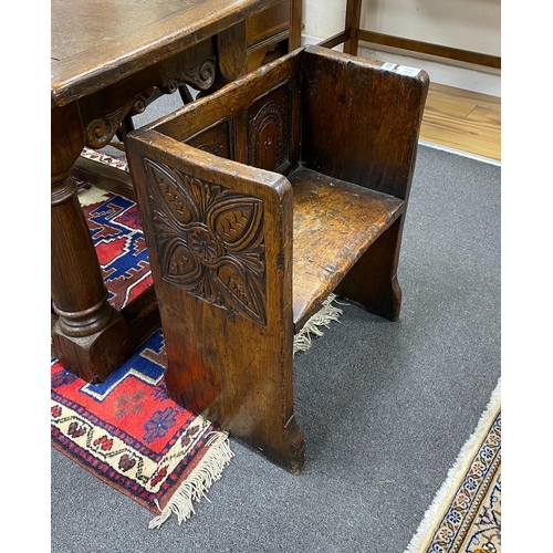 139 - A small 17th century style oak hall seat, width 53cm, depth 29cm, height 66cm