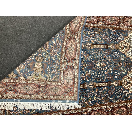 149 - North West Persian blue ground rug, 190cm x 126cm