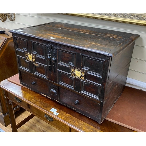 162 - A mid 17th century Continental panelled oak mule chest, with engraved bone inset monograms R.W a... 