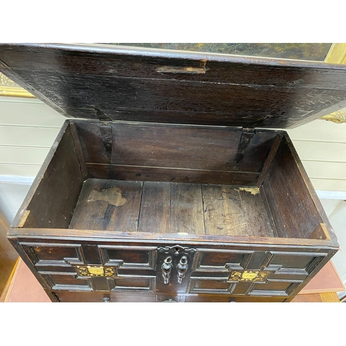 162 - A mid 17th century Continental panelled oak mule chest, with engraved bone inset monograms R.W a... 