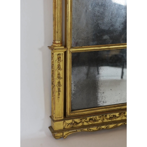 167 - A George III giltwood pier glass, the tabernacle style frame with flowers in a basket and swans neck... 