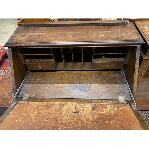 170 - An 18th century style carved oak bureau, width 87cm, depth 47cm, height 106cm