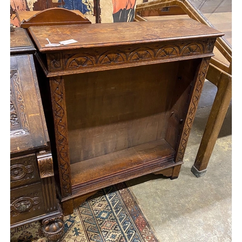 172 - An 18th century style carved oak open bookcase, length 91cm, depth 27cm, height 106cm