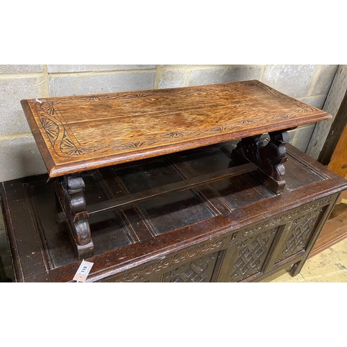 177 - A rectangular carved oak coffee table, length 104cm, depth 44cm, height 39cm