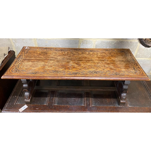 177 - A rectangular carved oak coffee table, length 104cm, depth 44cm, height 39cm