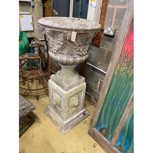 181 - A reconstituted stone circular campana garden urn, on a square plinth, diameter 58cm, height 125cm... 