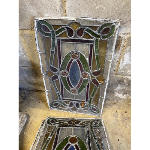 183 - Four rectangular stained glass panels, each width 33cm, height 53cm