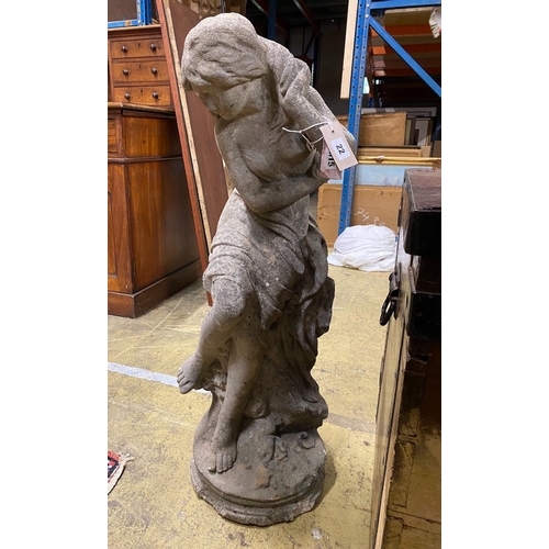 22 - A reconstituted stone garden ornament of a female bather, height 84cm