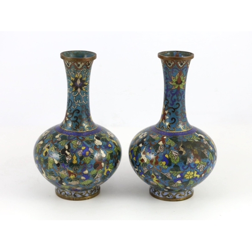 252 - A pair of Chinese cloisonné enamel gourd vine vases, early 19th century, decorated in colours with... 