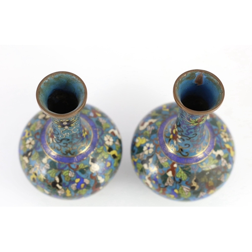 252 - A pair of Chinese cloisonné enamel gourd vine vases, early 19th century, decorated in colours with... 