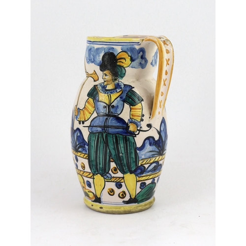 258 - An Italian maiolica jug (boccale), probably Montelupo, 18th/19th century, painted with a soldier hol... 