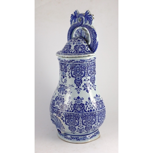 291 - A large Rouen faience blue and white cistern, second quarter 18th century, painted with foliate scro... 