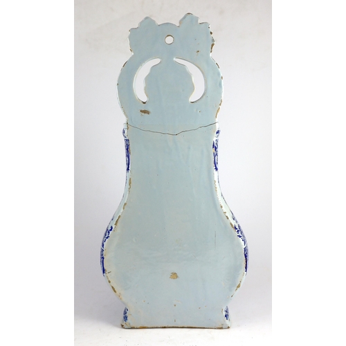 291 - A large Rouen faience blue and white cistern, second quarter 18th century, painted with foliate scro... 