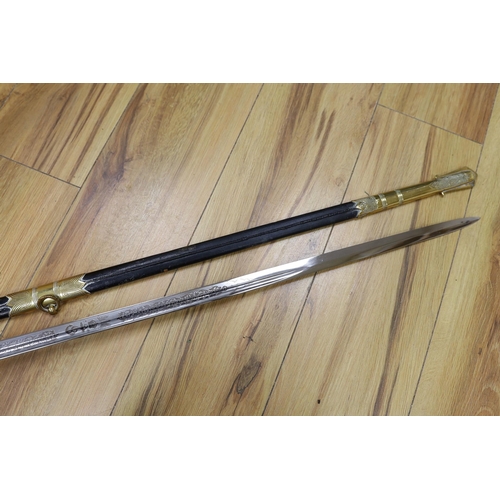 299 - A QEII Naval officer's dress sword and scabbard