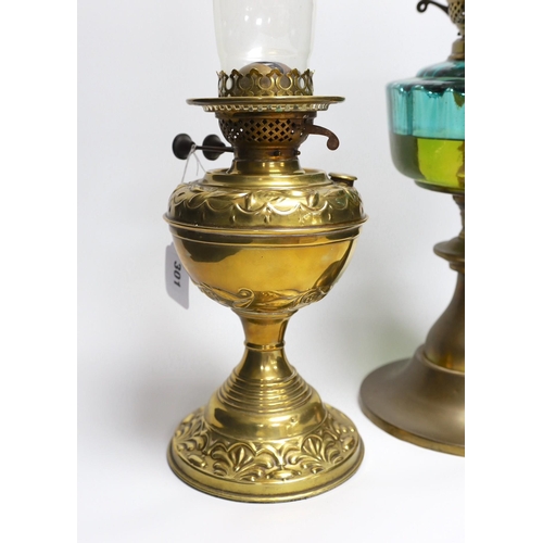 301 - A Victorian brass oil lamp and one other lamp (2)