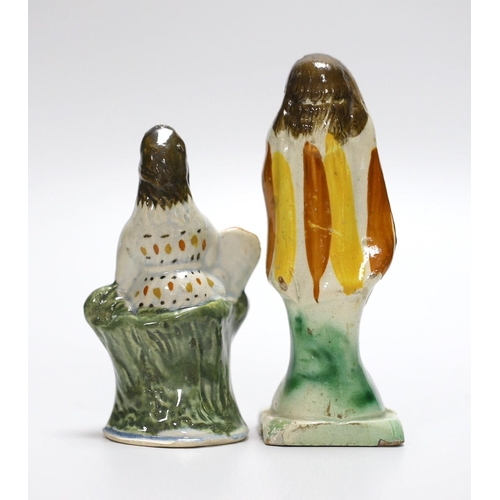 304 - Two Georgian slip-cast Prattware figures and a Victorian salt glazed stoneware novelty pistol liquor... 