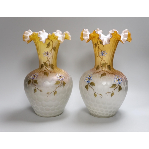 308 - A pair of late 19th century quilted satin glass vases, 29.5cm high