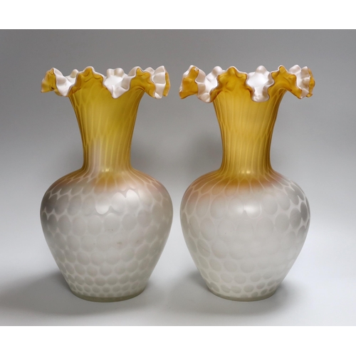 308 - A pair of late 19th century quilted satin glass vases, 29.5cm high