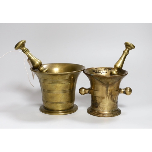 317 - Two 18th/19th century brass mortars, with pestles