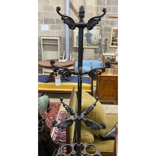 32 - A Victorian style painted cast iron coat and stick stand, height 182cm