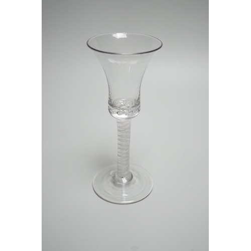 323 - An 18th century Double series opaque twist stem wine glass. 18.5cm tall