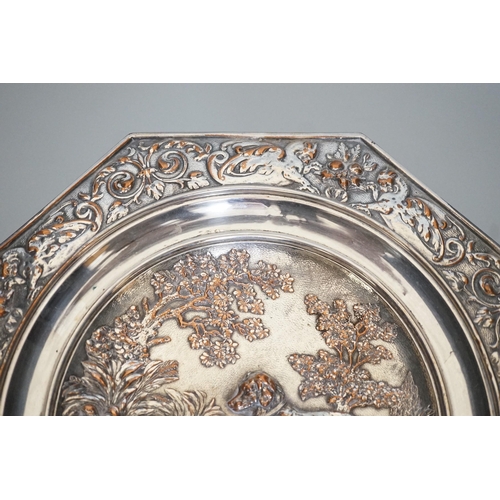 325 - An early 20th century Elkington type silver plated tazza embossed with hunting dogs, 29cm