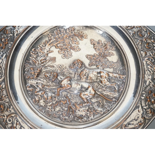 325 - An early 20th century Elkington type silver plated tazza embossed with hunting dogs, 29cm