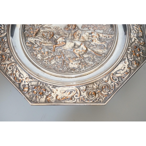 325 - An early 20th century Elkington type silver plated tazza embossed with hunting dogs, 29cm