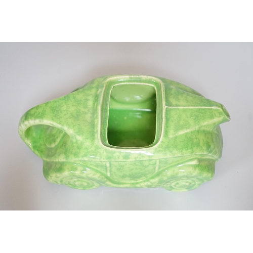 327 - A Sadler's green-glazed novelty racing car teapot, 22cm