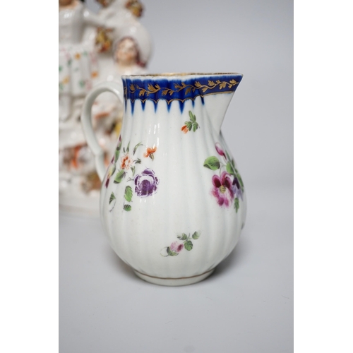 328 - A Worcester milk jug, c.1780, a Newhall-type cream jug, c.1795, a Staffordshire porcelain model of a... 