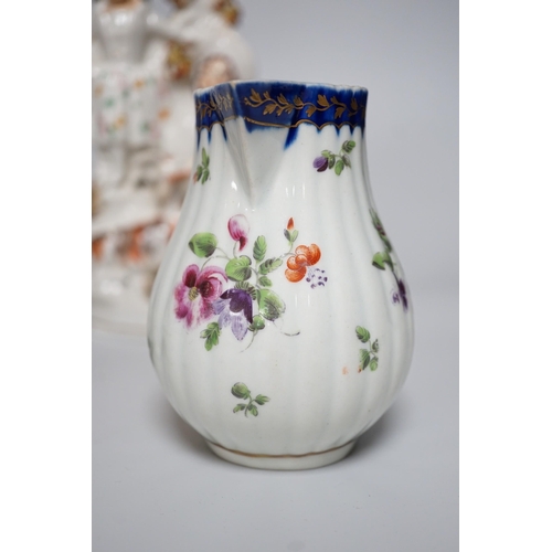 328 - A Worcester milk jug, c.1780, a Newhall-type cream jug, c.1795, a Staffordshire porcelain model of a... 