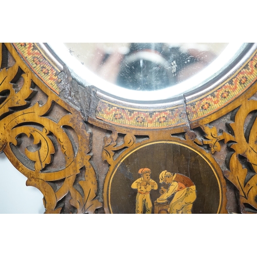 334 - A 19th century fretted olivewood Sorrento ware toilet mirror, 45cm long