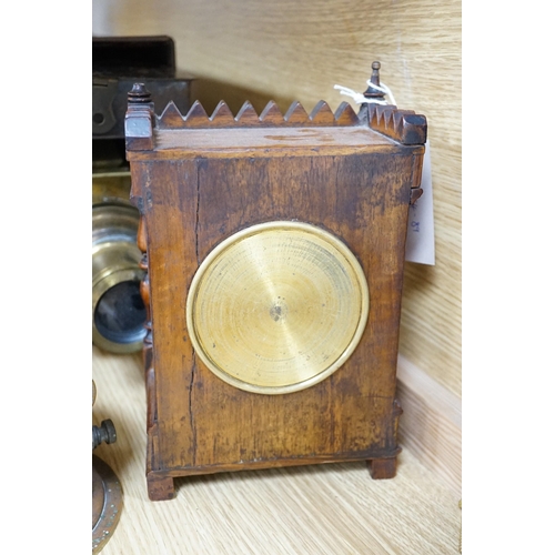 336 - A cased tinplate and pressed brass Magic Lantern, Case 46 cm long, A French walnut cased mantel time... 